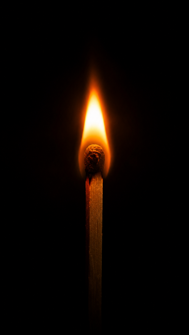 Single Match Flame on Black